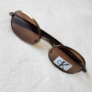 Vibtage Calvin Klein Gold Frame Sunglasses with Brown Lenses